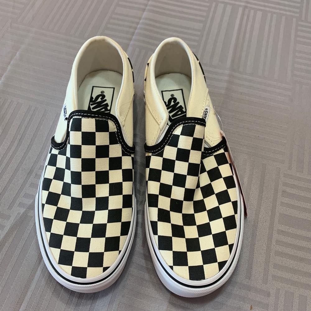 Checkered Vans slip ons
